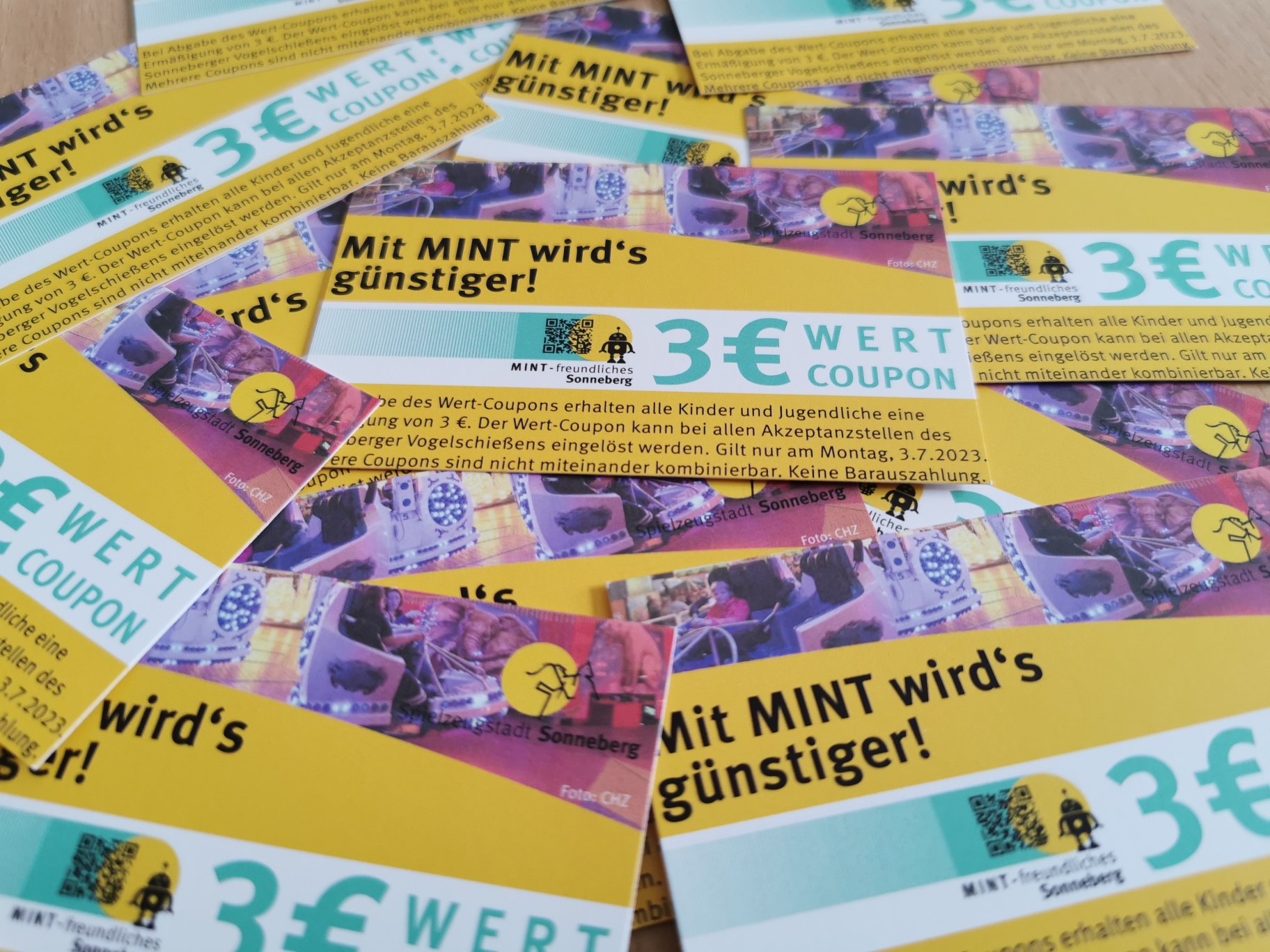 3 Euro-Coupons mit der Aufschrift: Mit Mint wird's günstiger.